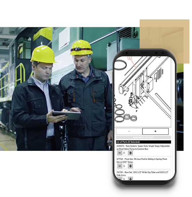 Two men in hard hats on a shop floor looking at a tablet